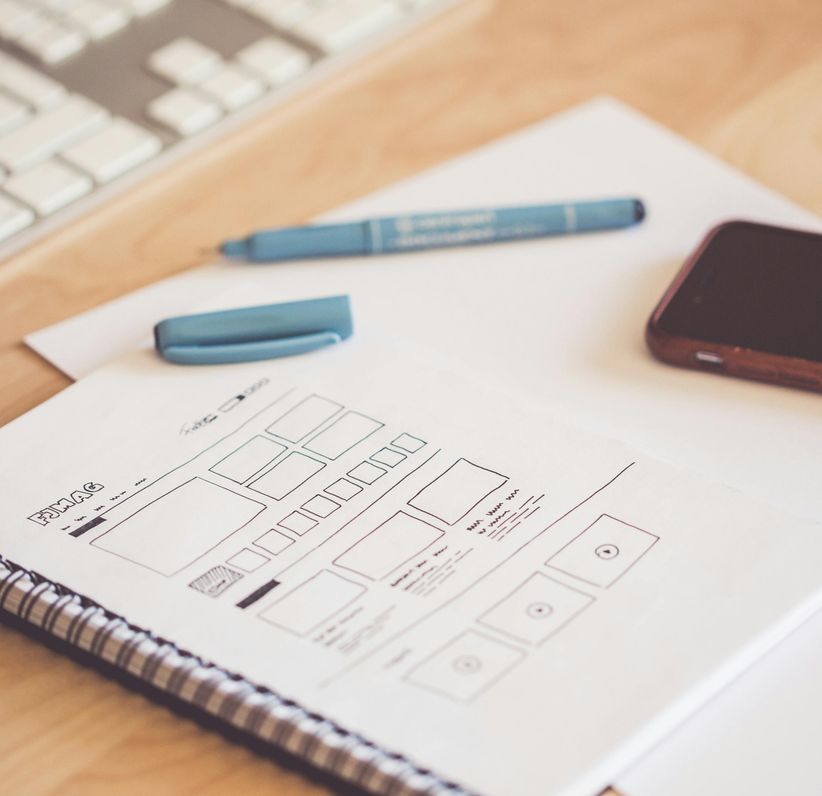 Image of a hand drawn wireframe of what a website will look like